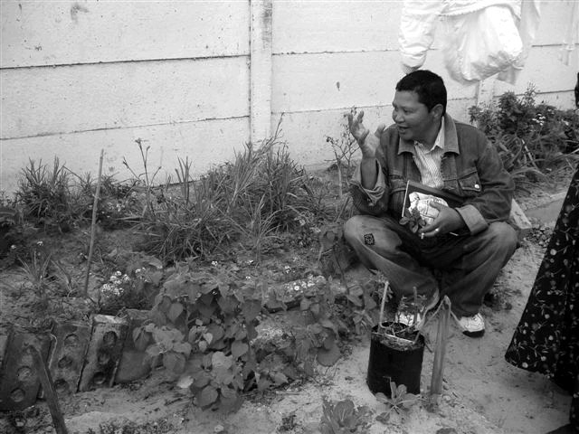 Malinda Droomer, a lesbian gender activist leading a gardening training in Atlantis.